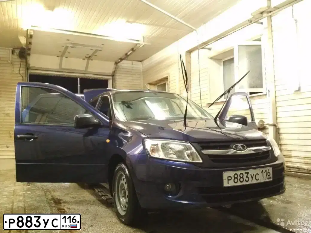 Фото автомобиля LADA 2190 GRANTA, 2013 — госномер А368РН702. Цвет: синий