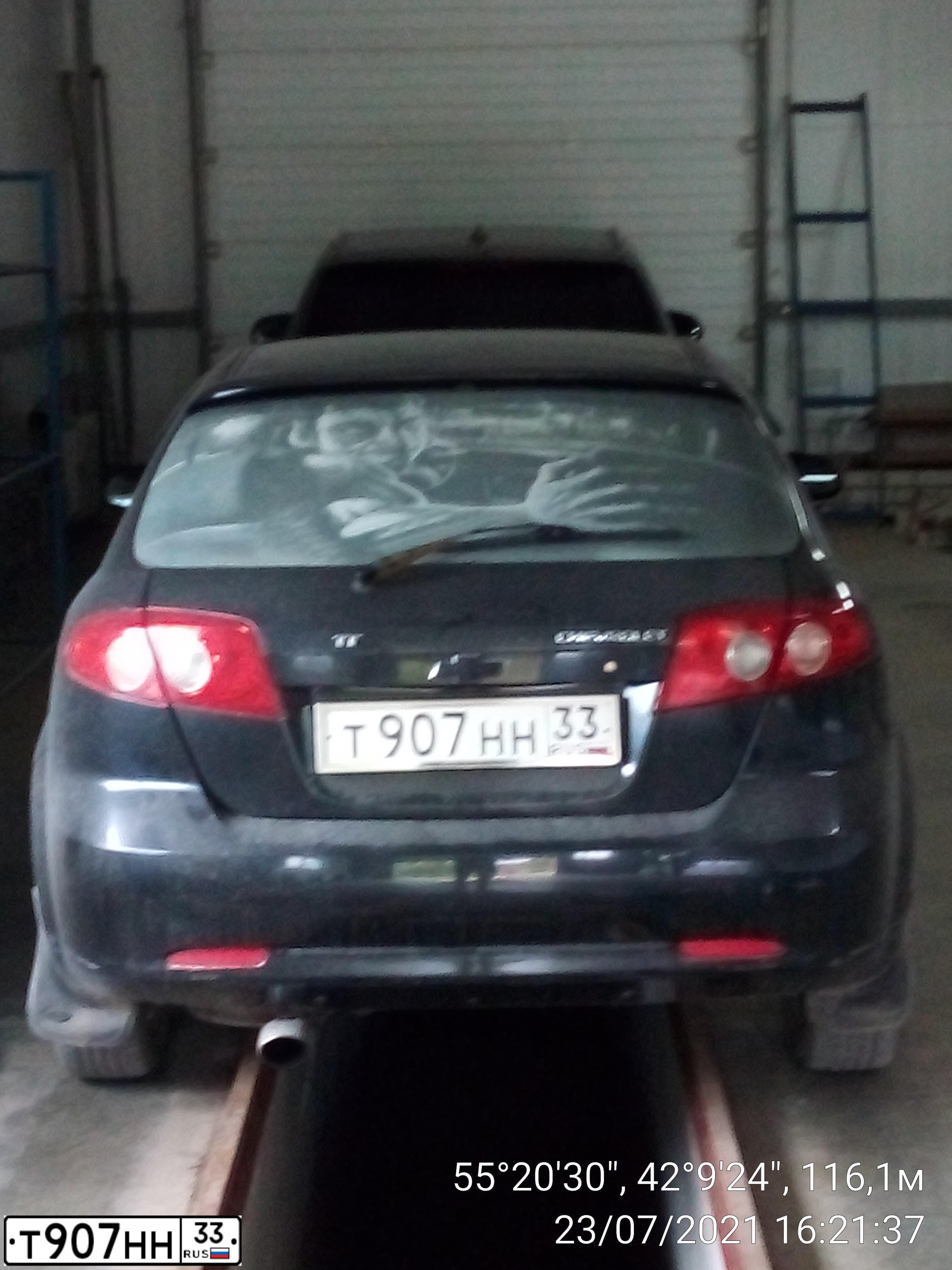 Фото автомобиля CHEVROLET LACETTI, 2007 — госномер Т704КМ62. Цвет: ЧЕРНЫЙ