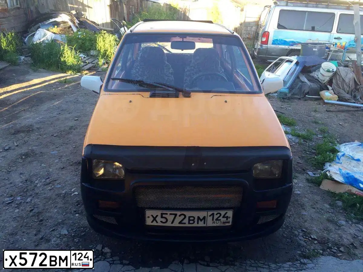 Фото автомобиля SEAZ OKA, 2000 — госномер Х572ВМ124. Цвет: Золотисто-желтый