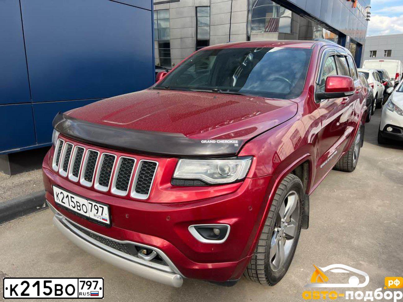 Фото автомобиля JEEP GRAND CHEROKEE, 2013 — госномер Р505СС799. Цвет: КРАСНЫЙ ТЕМНЫЙ