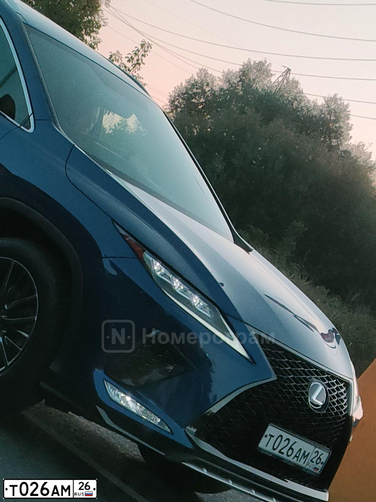 Фото автомобиля LEXUS RX, 2020 — госномер Т026АМ26. Цвет: синий