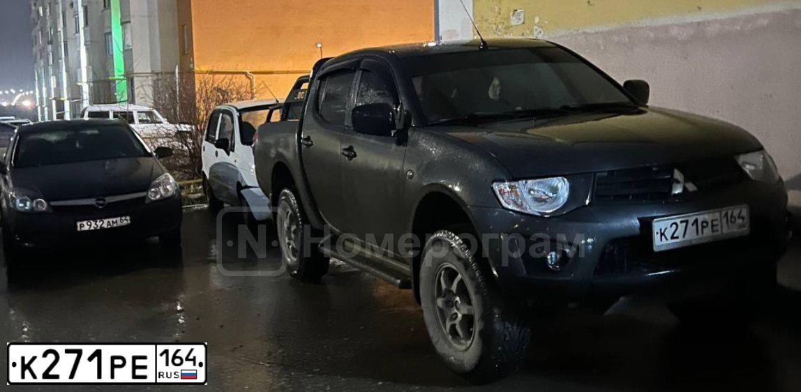 Фото автомобиля MITSUBISHI L 200, 2011 — госномер К271РЕ164. Цвет: СЕРЫЙ