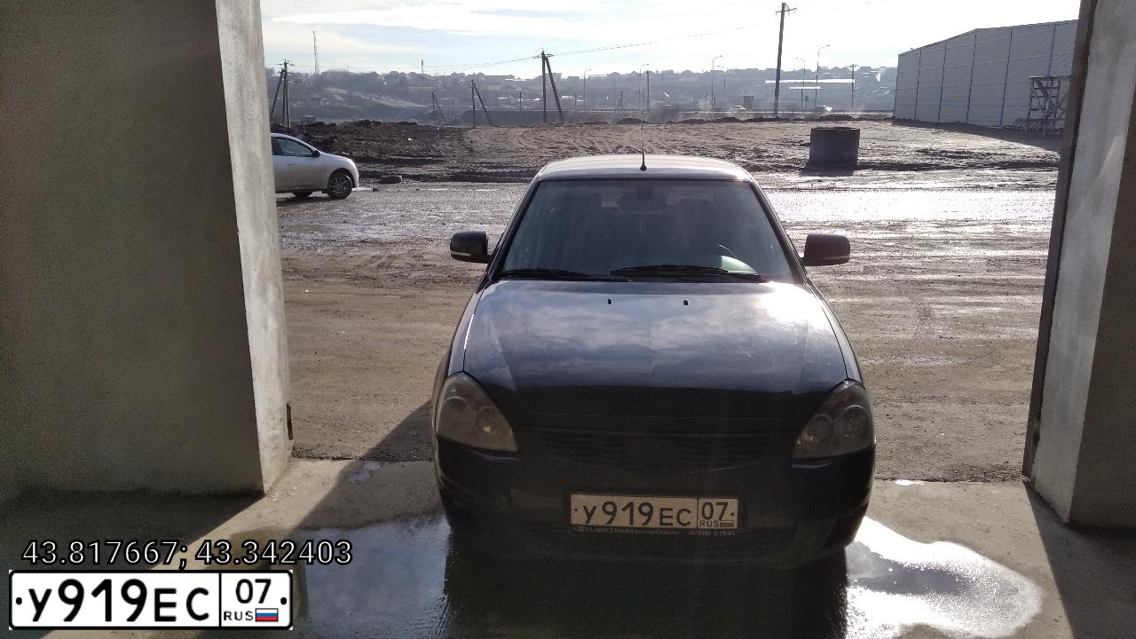 Фото автомобиля LADA PRIORA, 2015 — госномер Е704ЕР550. Цвет: ЧЕРНЫЙ