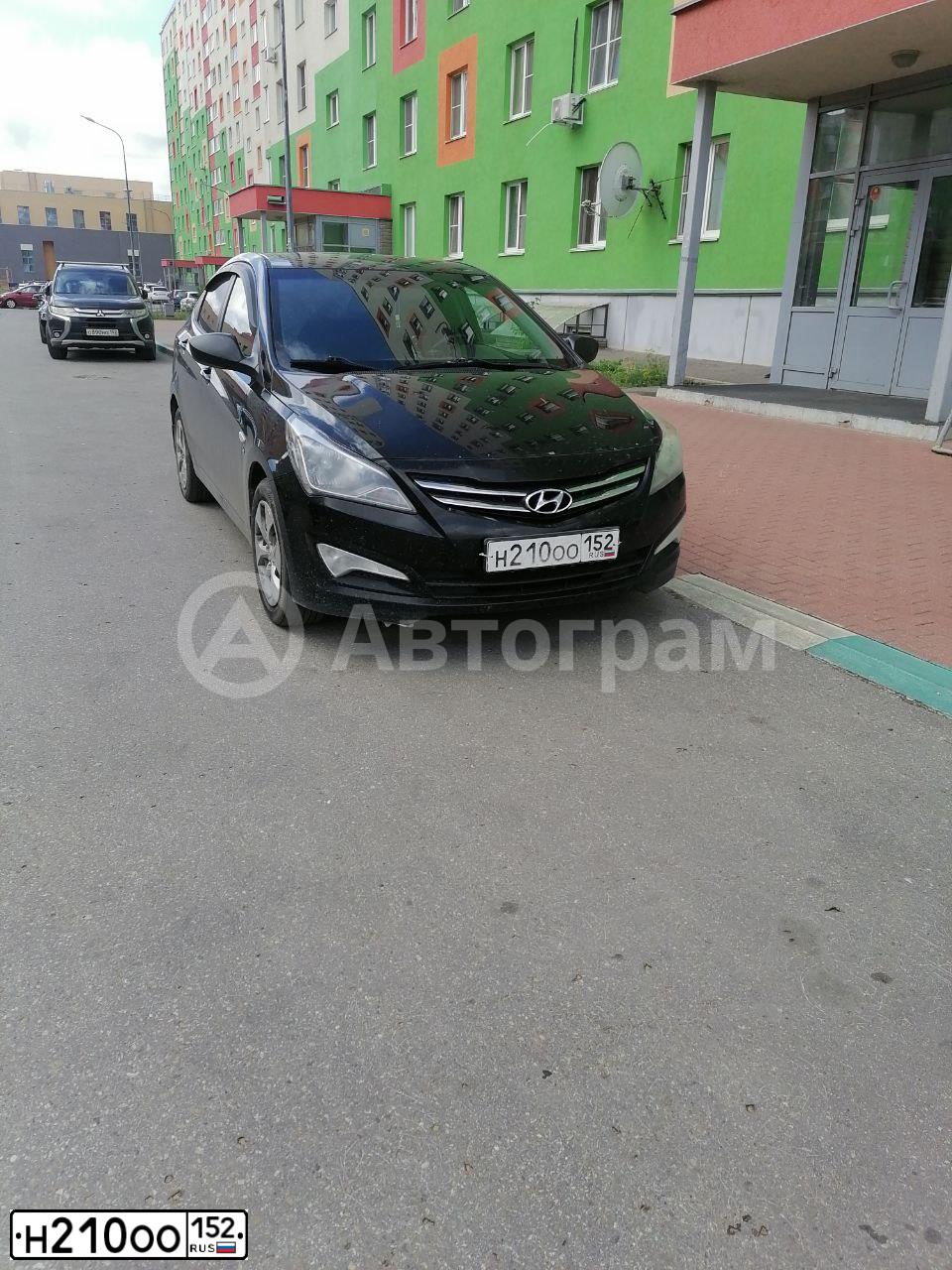 Фото автомобиля HYUNDAI SOLARIS, 2014 — госномер Н210ОО152. Цвет: ЧЕРНЫЙ
