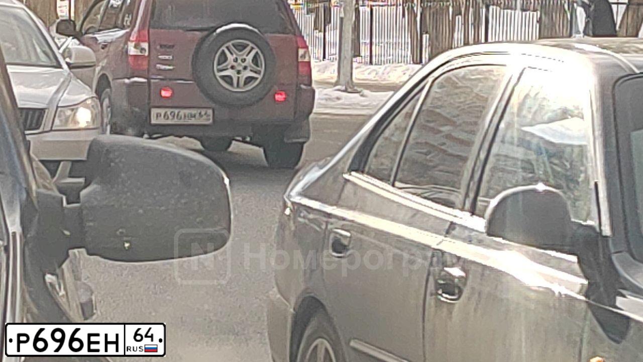 Фото автомобиля LADA 1118 KALINA, 2006 — госномер Р696ЕН64. Цвет: СЕРО СИНИЙ