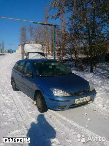 Фото автомобиля FORD FOCUS, 2003 — госномер Н163КВ136