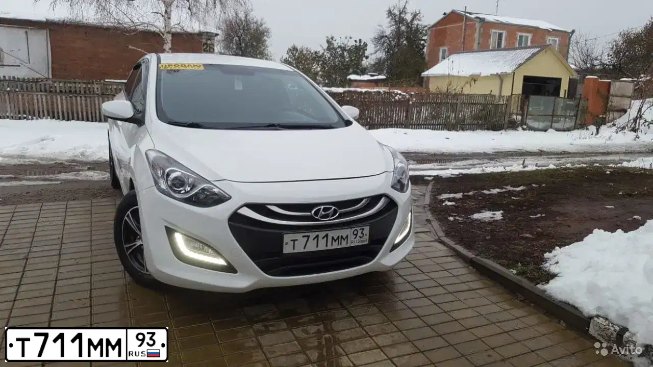 Фото автомобиля LADA 1117 KALINA, 2011 — госномер Т711ММ93. Цвет: Белый
