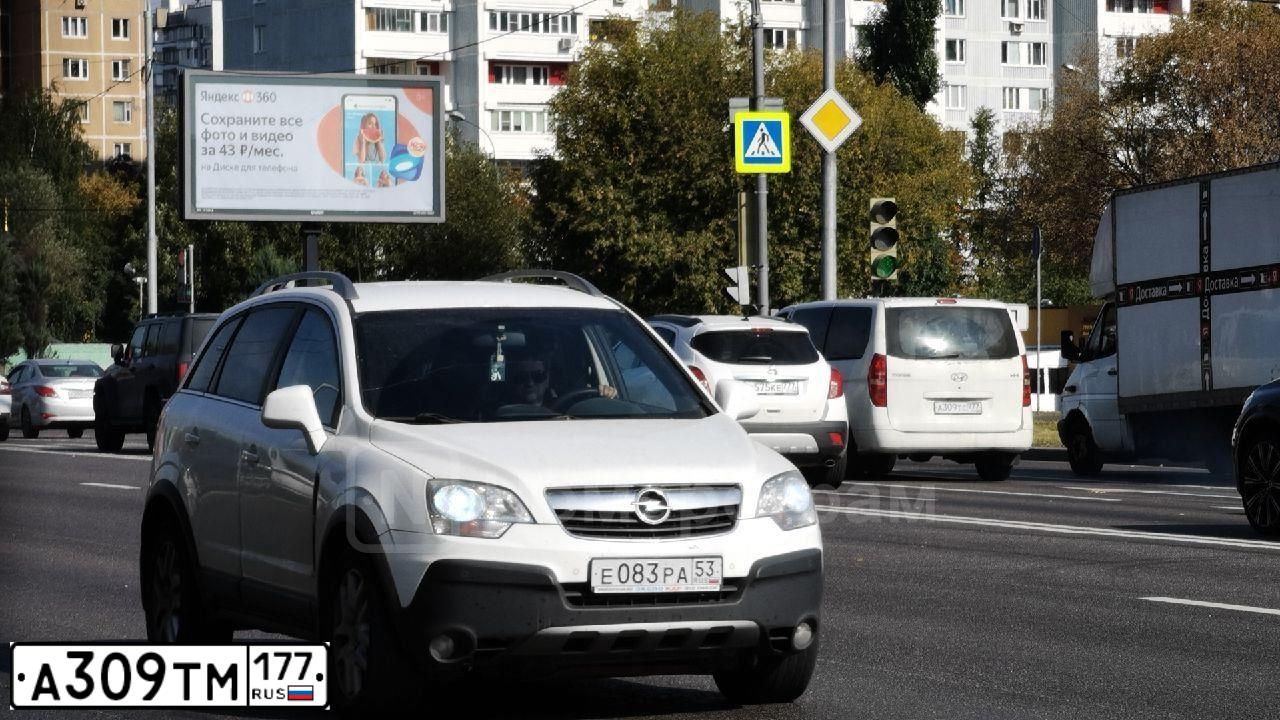 Фото автомобиля SUZUKI LIANA, 2007 — госномер К372МК190. Цвет: БЕЖЕВЫЙ