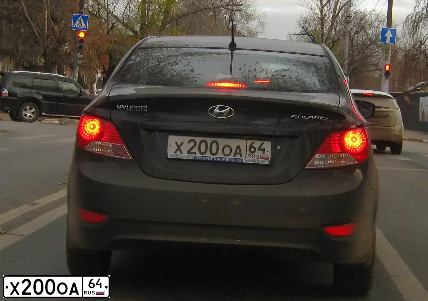 Фото автомобиля NISSAN ALMERA /AVTOVAZ/, 2014 — госномер Х200ОА64. Цвет: Серебристый
