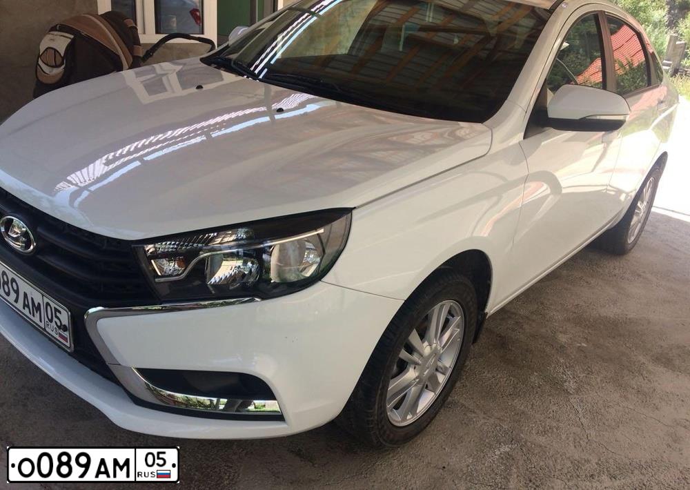 Фото автомобиля LADA VESTA, 2016 — госномер О089АМ05. Цвет: Белый