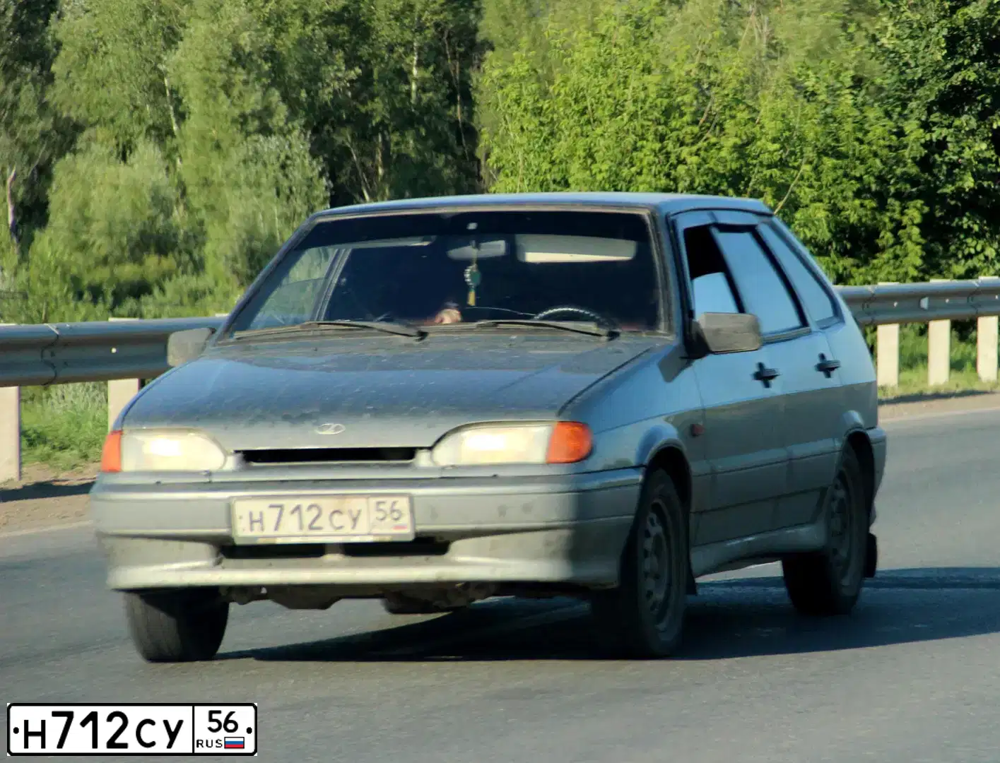 Фото автомобиля LADA 2114 SAMARA, 2006 — госномер Н712СУ56. Цвет: СЕРО-ЗЕЛЕНЫЙ
