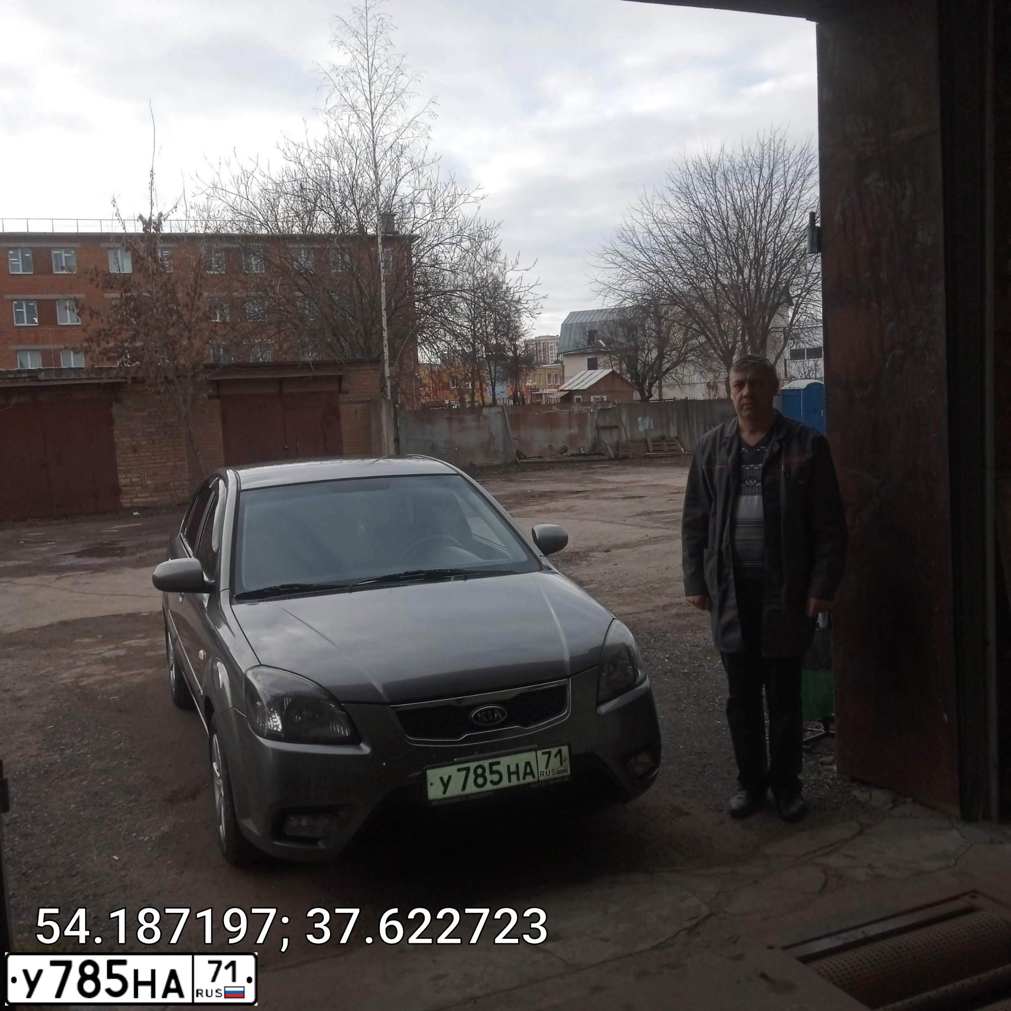Фото автомобиля KIA RIO, 2009 — госномер У785НА71. Цвет: СЕРЫЙ