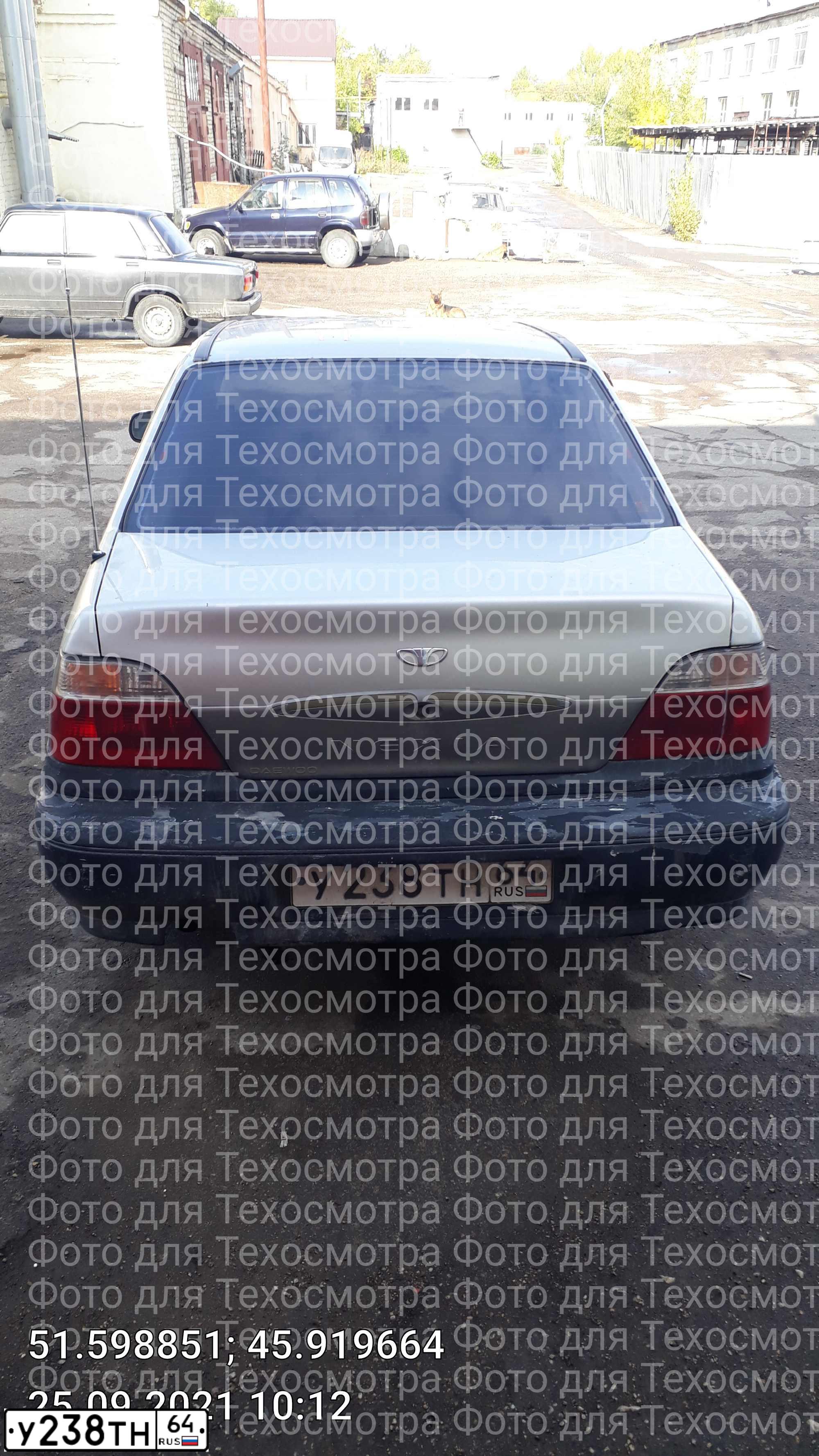 Фото автомобиля DAEWOO NEXIA, 2004 — госномер У238ТН64. Цвет: БЕЛЫЙ(СЕРЕБРИСТЫЙ