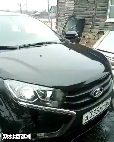 Фото автомобиля LADA XRAY, 2017 — госномер А335МР67. Цвет: ЧЕРНЫЙ