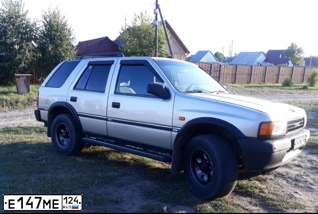 Фото автомобиля OPEL FRONTERA, 1993 — госномер В602АУ38. Цвет: СЕРЫЙ