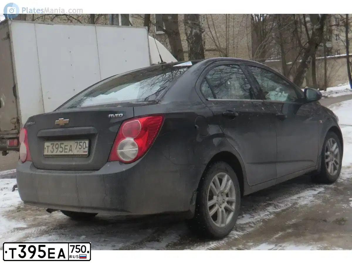Фото автомобиля CHEVROLET AVEO, 2013 — госномер Т395ЕА750. Цвет: ЧЕРНЫЙ