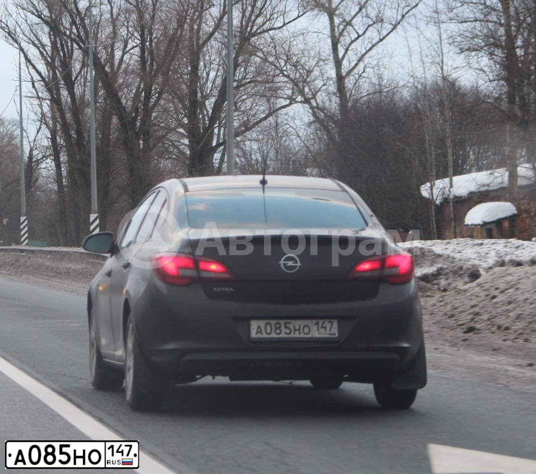 Фото автомобиля OPEL ASTRA, 2014 — госномер А085НО147