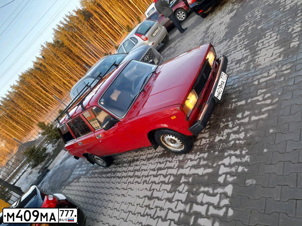 Фото автомобиля LADA 2104, 2006 — госномер М409МА777. Цвет: КРАСНЫЙ