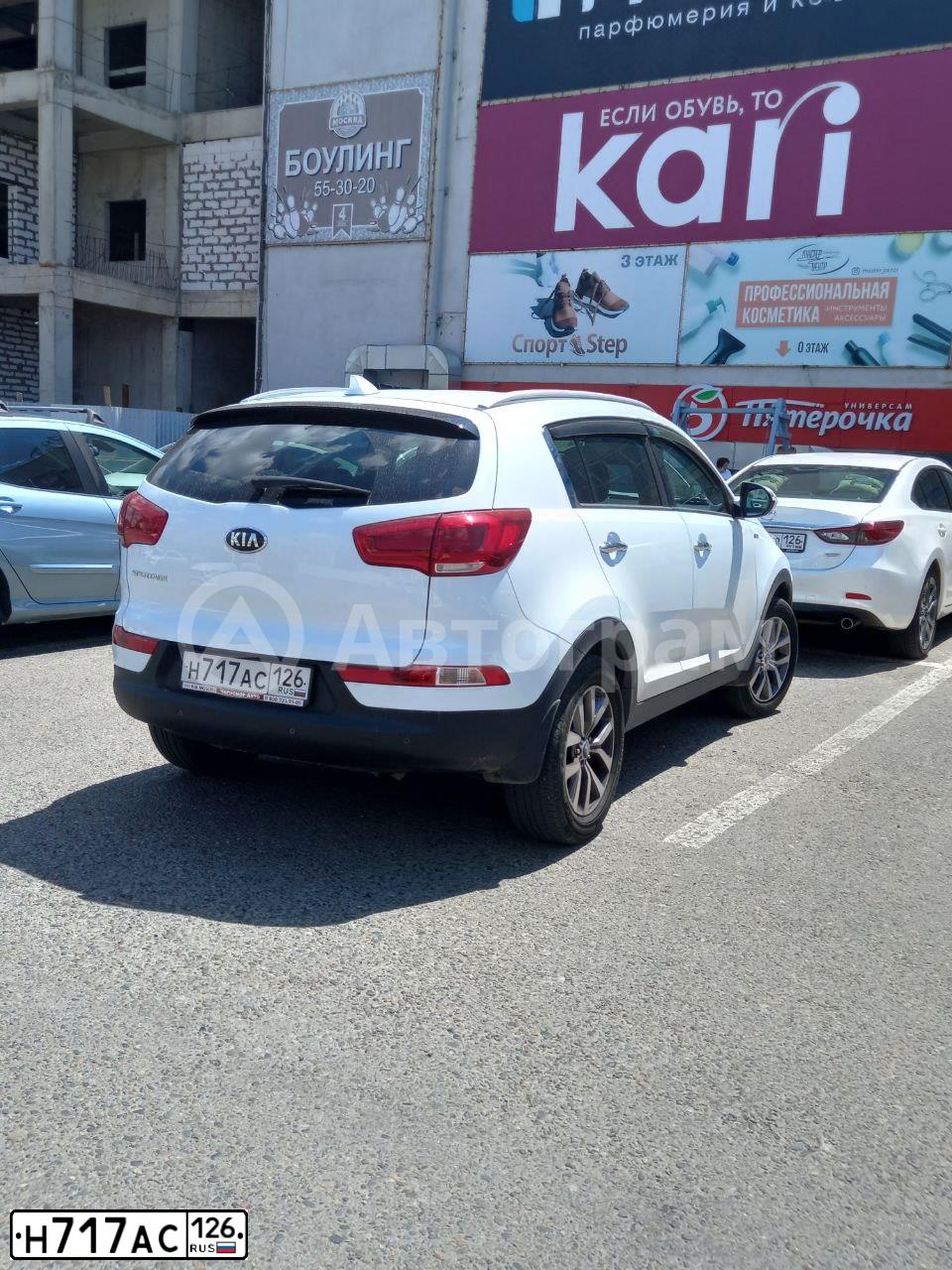 Фото автомобиля KIA SPORTAGE, 2014 — госномер Н717АС126. Цвет: Белый