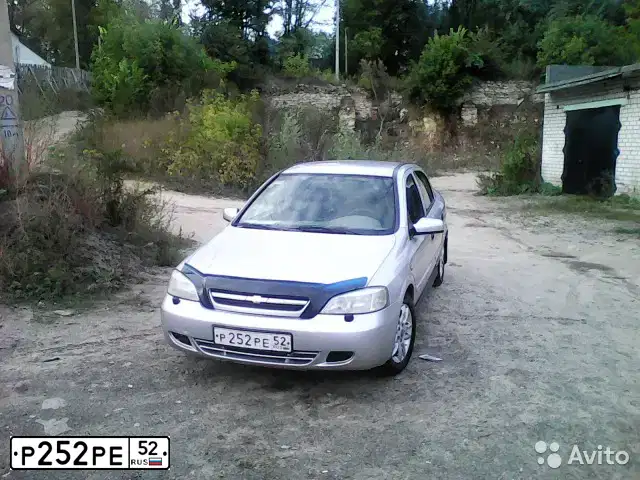 Фото автомобиля CHEVROLET VIVA, 2005 — госномер К811ХС33. Цвет: Светло-серебристый металик