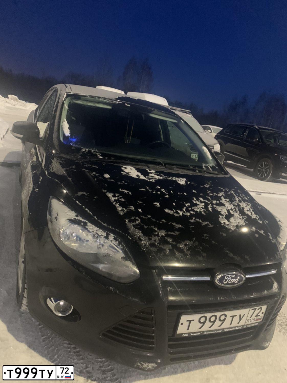 Фото автомобиля FORD FOCUS, 2012 — госномер Т999ТУ72. Цвет: ЧЕРНЫЙ