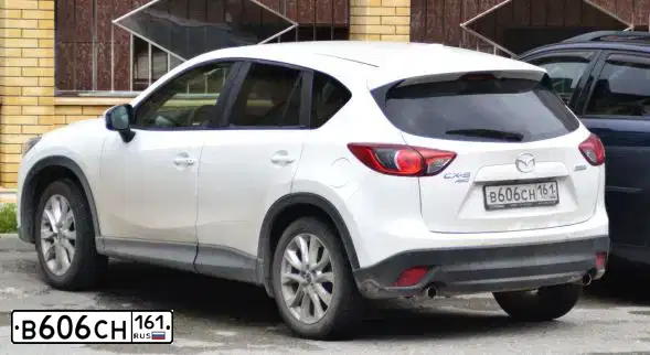 Фото автомобиля MAZDA CX-5, 2013 — госномер А365НМ30. Цвет: БЕЛЫЙ ПЕРЛАМУТР