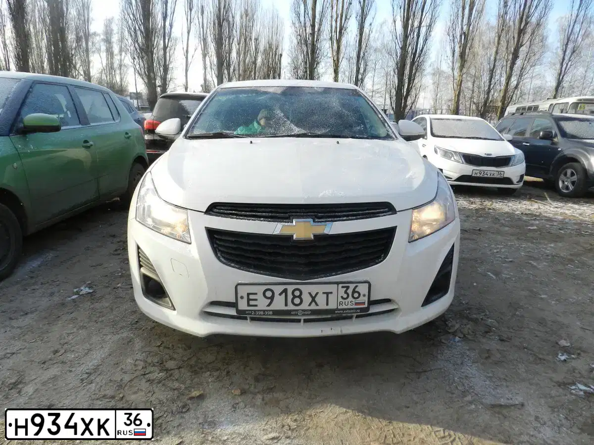 Фото автомобиля KIA RIO, 2013 — госномер К233ТА134. Цвет: Белый