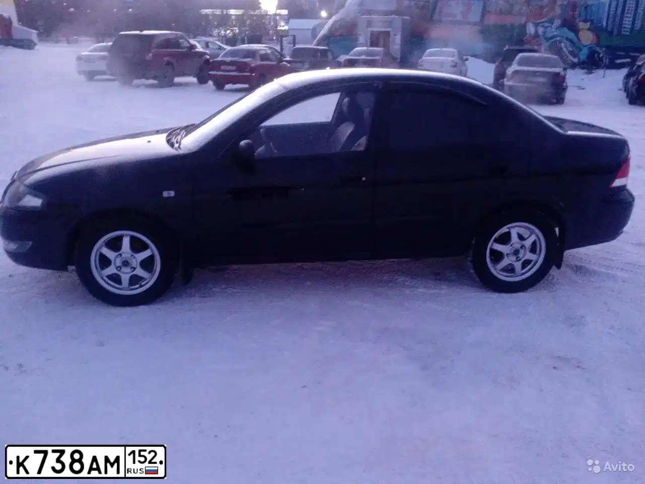 Фото автомобиля NISSAN ALMERA, 2011 — госномер К738АМ152. Цвет: ЧЕРНЫЙ