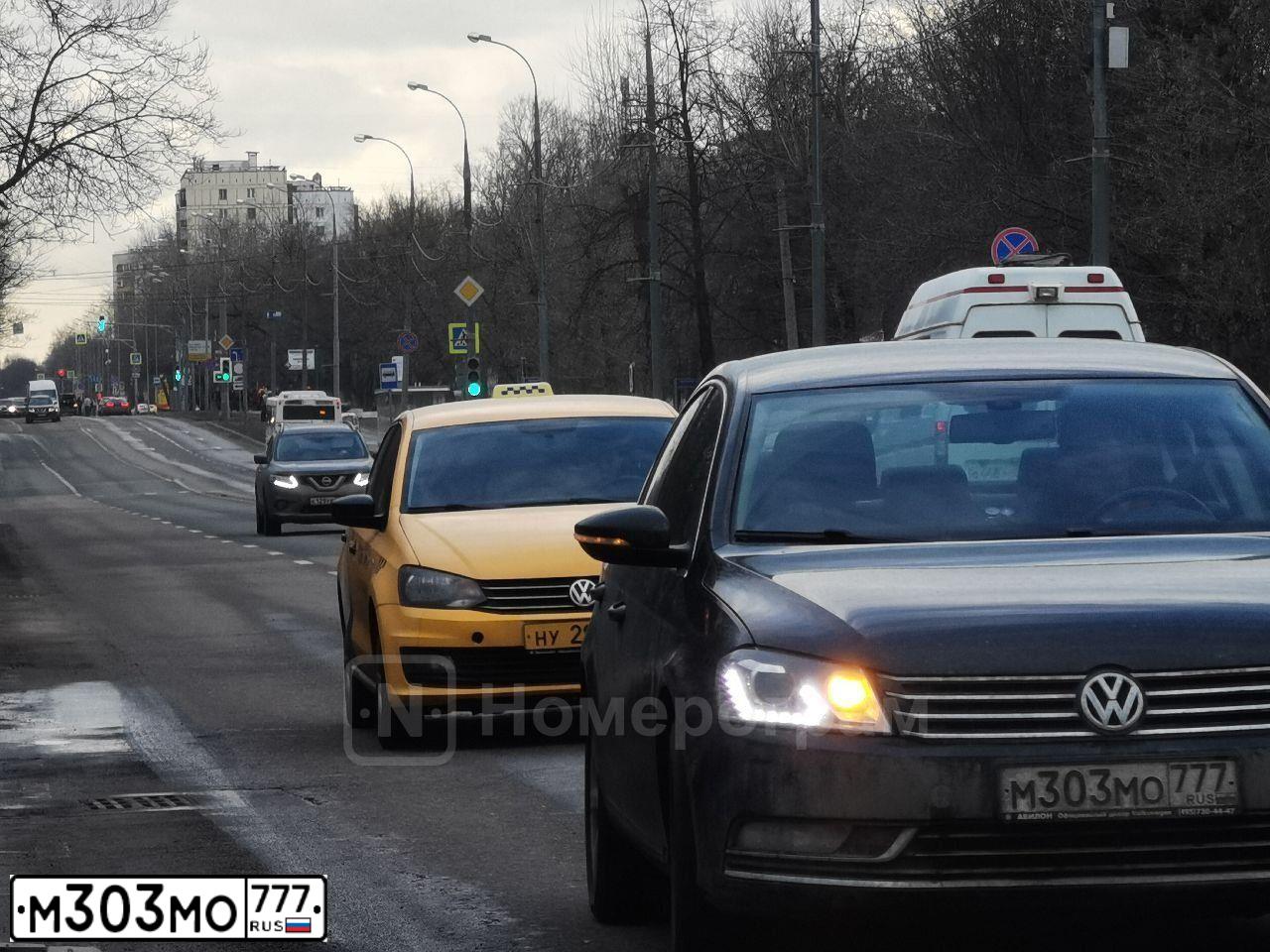 Фото автомобиля VOLKSWAGEN PASSAT, 2014 — госномер М303МО777. Цвет: ЧЕРНЫЙ