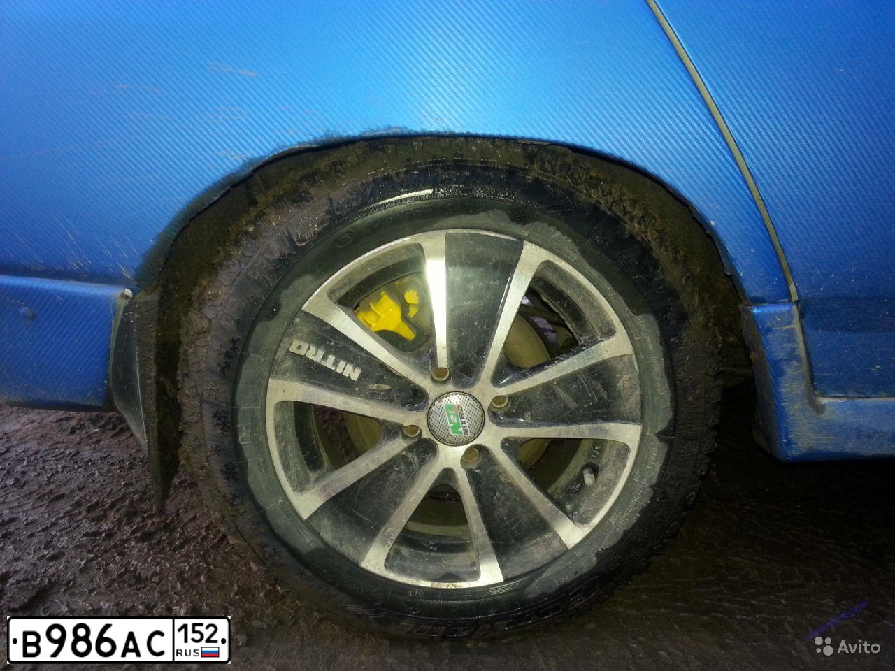 Фото автомобиля LADA 2112, 2005 — госномер В986АС152. Цвет: ЧЕРНЫЙ СИНИЙ