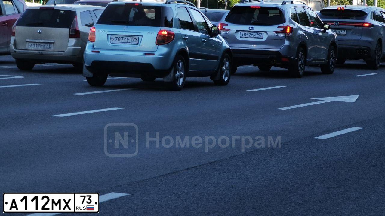 Фото автомобиля RENAULT MEGANE, 2008 — госномер А112МХ73. Цвет: ЗОЛОТИСТЫЙ