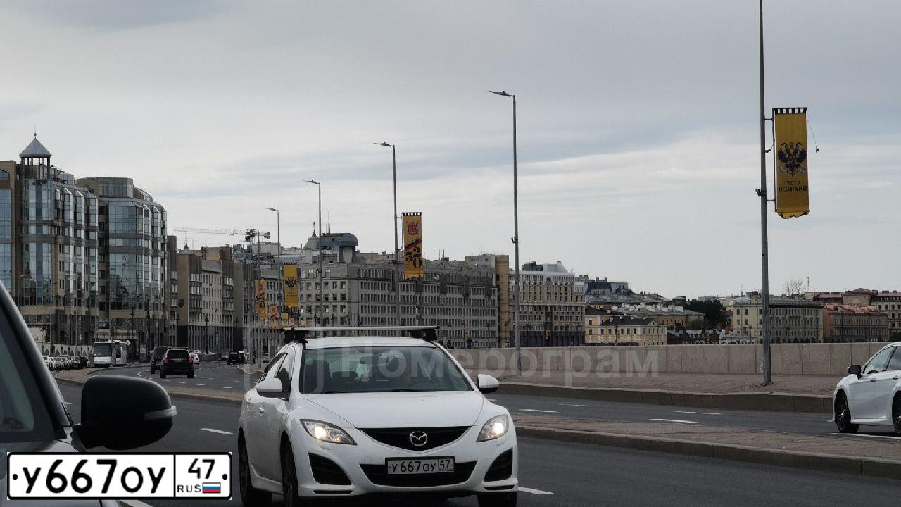 Фото автомобиля MAZDA 6, 2011 — госномер У667ОУ47. Цвет: БЕЛЫЙ