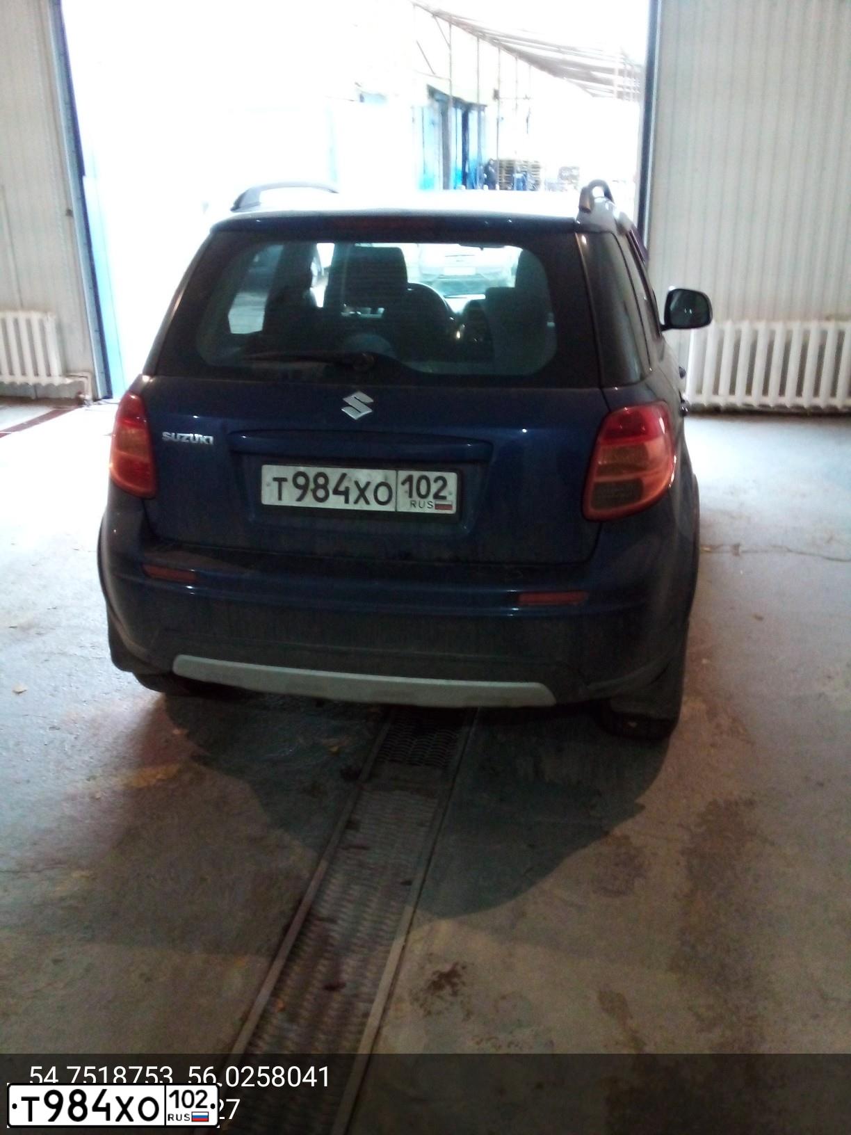 Фото автомобиля SUZUKI SX4, 2008 — госномер Н012РМ702. Цвет: Темно-синий