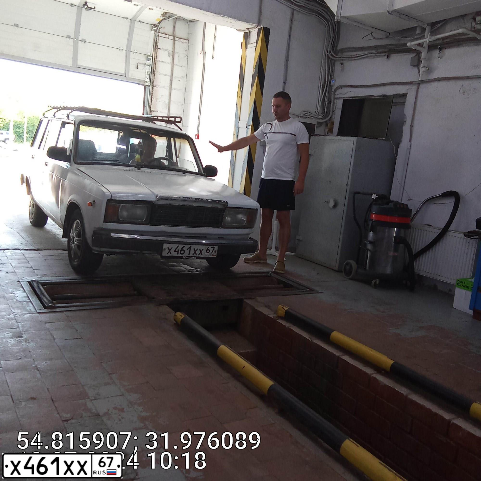 Фото автомобиля LADA 2104, 1997 — госномер А712ОР67. Цвет: Белый