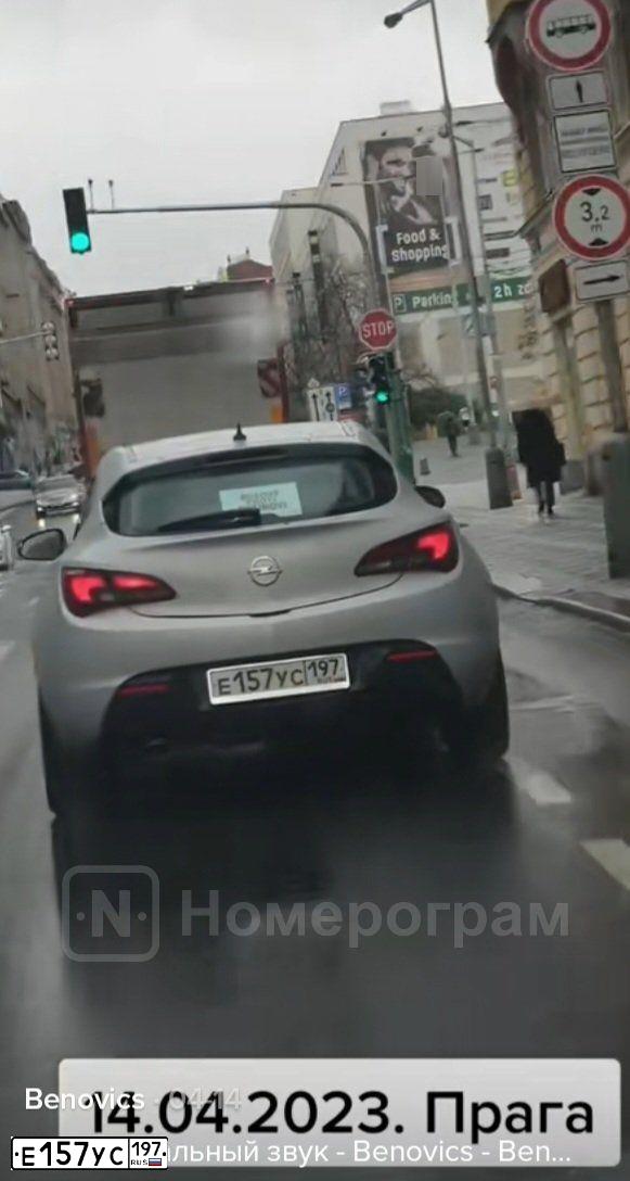 Фото автомобиля OPEL ASTRA, 2012 — госномер Е157УС197. Цвет: БЕЛЫЙ