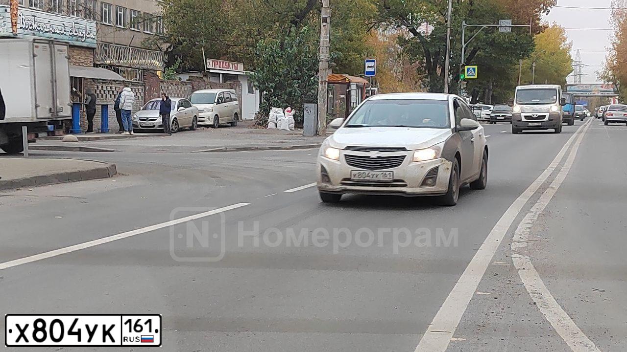 Фото автомобиля BMW SERIE 5, 2014 — госномер Х804УК161. Цвет: Коричневый