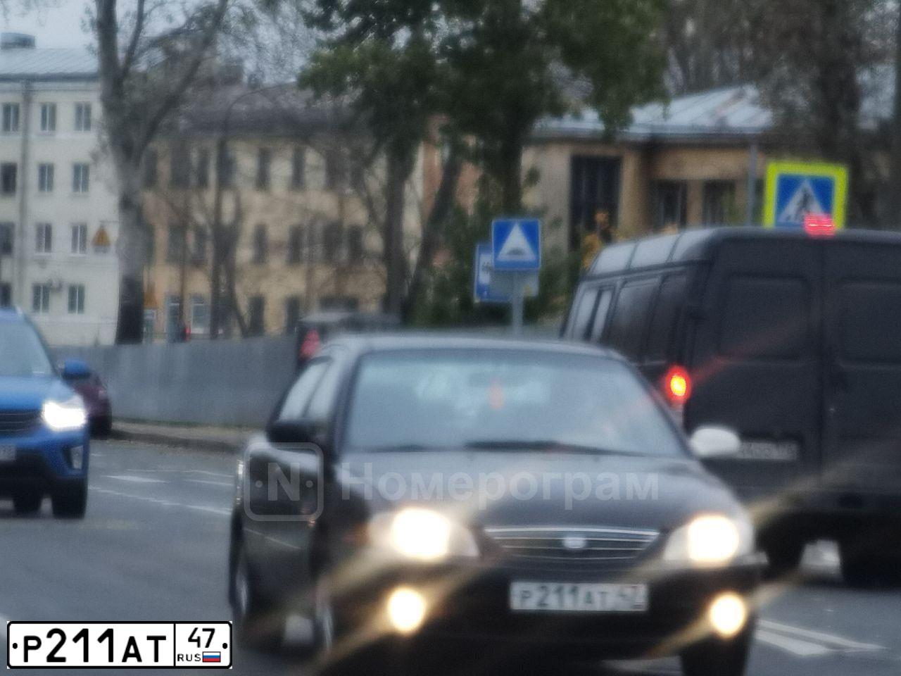 Фото автомобиля KIA SPECTRA, 2008 — госномер Р211АТ47. Цвет: ЧЕРНЫЙ