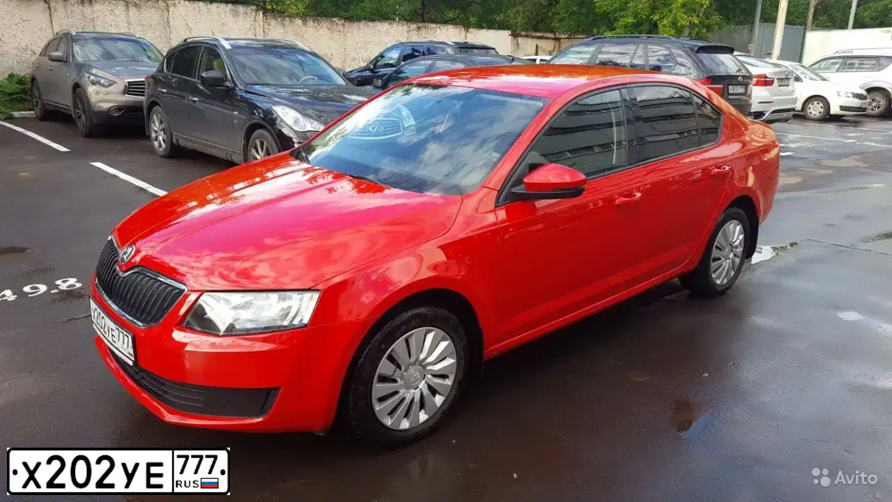 Фото автомобиля SKODA OCTAVIA, 2013 — госномер Х202УЕ777. Цвет: КРАСНЫЙ