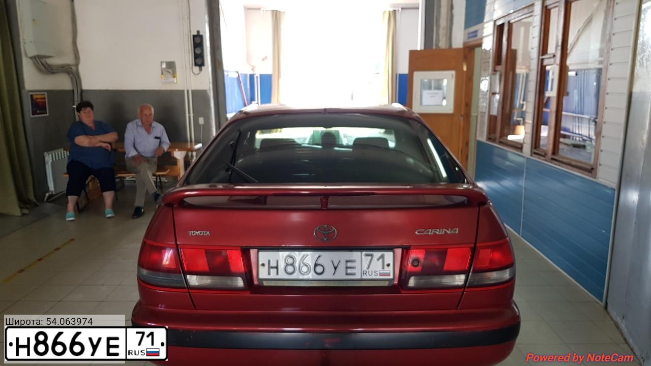 Фото автомобиля TOYOTA CARINA, 1994 — госномер В275УК790. Цвет: Красный