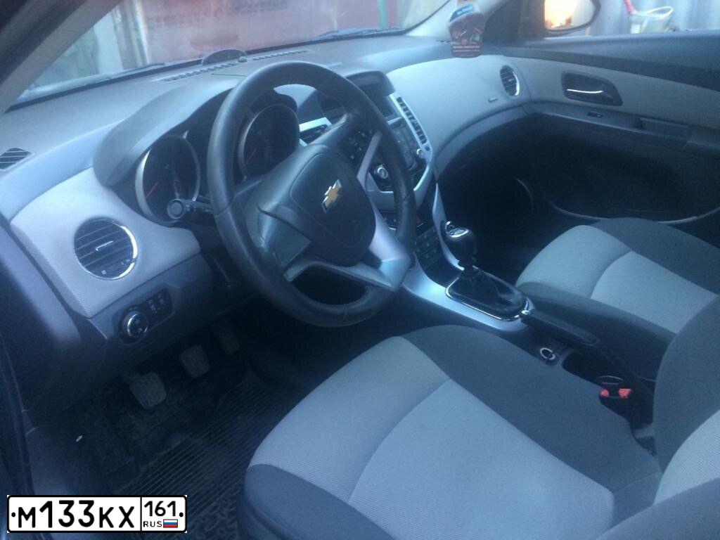 Фото автомобиля CHEVROLET CRUZE, 2010 — госномер М133КХ161. Цвет: ЧЕРНЫЙ