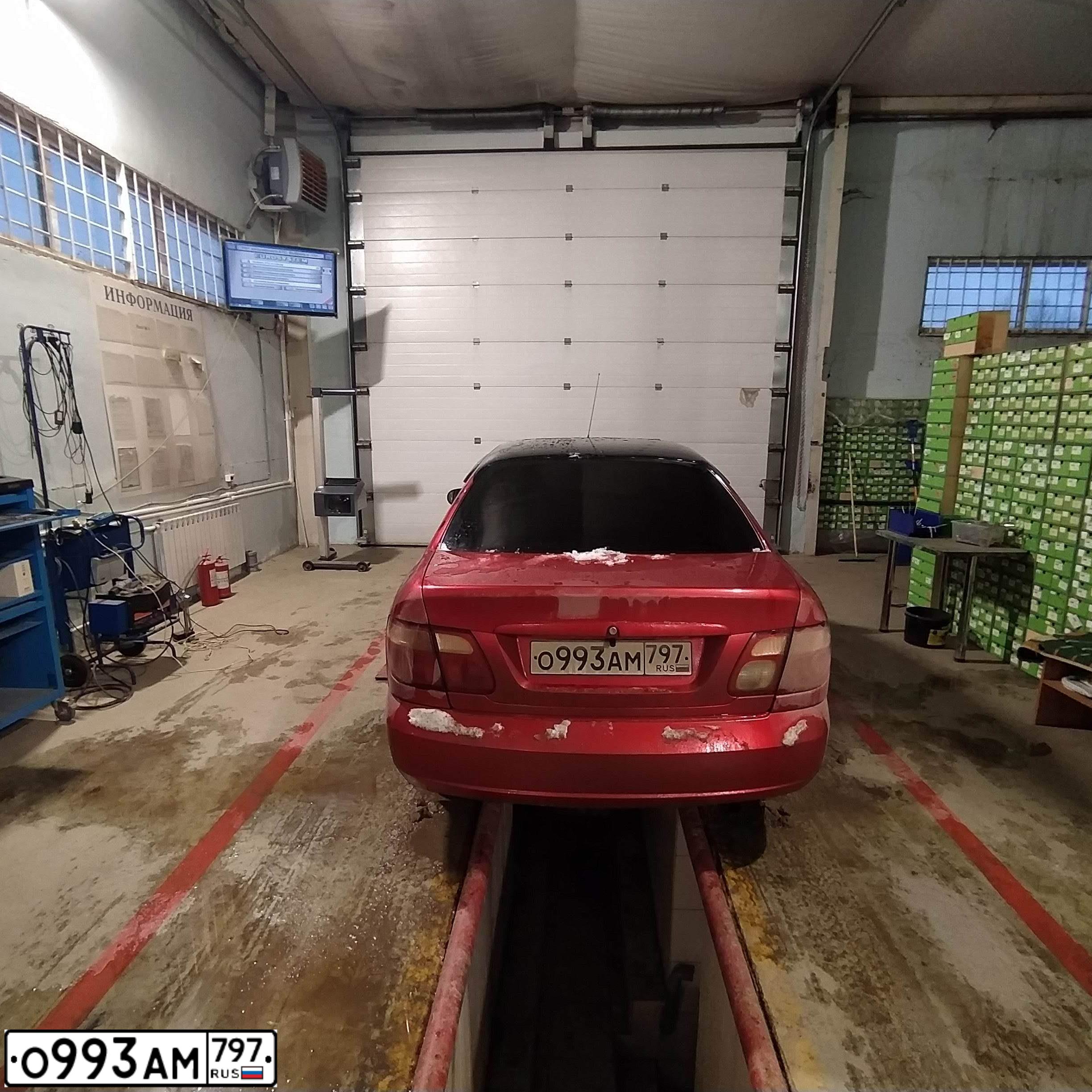 Фото автомобиля NISSAN ALMERA, 2005 — госномер О993АМ797. Цвет: КРАСНЫЙ