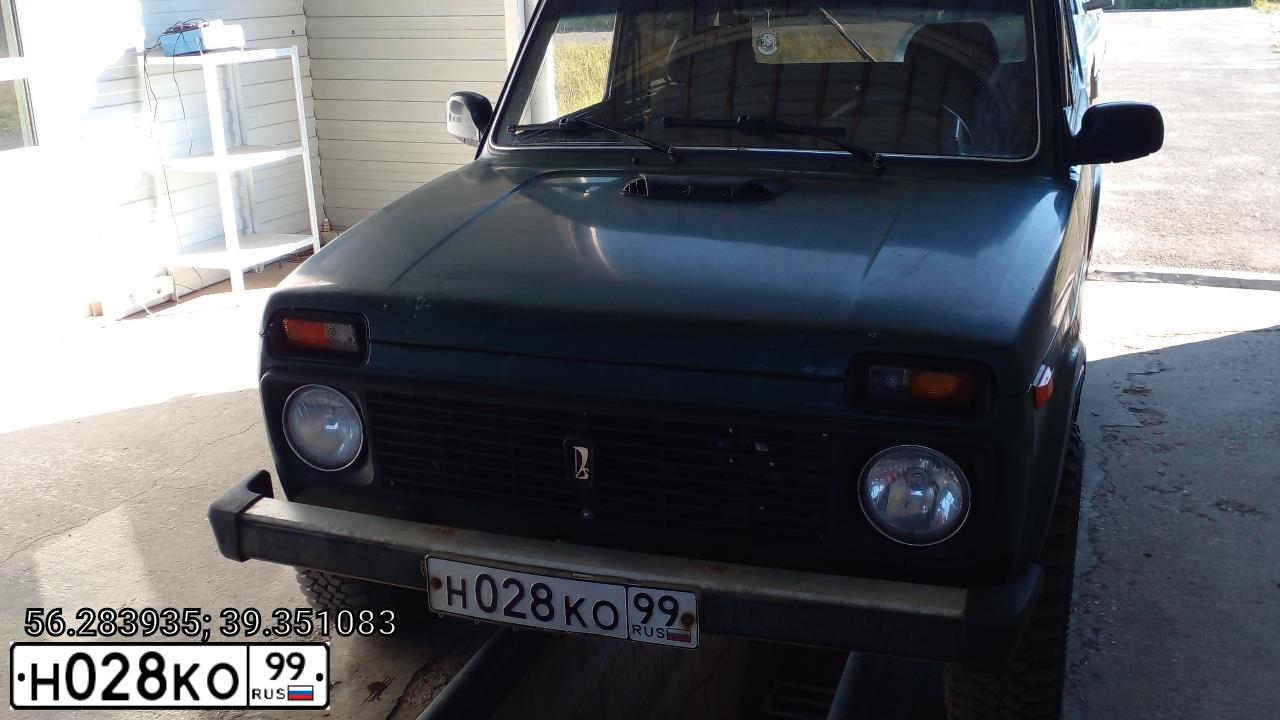 Фото автомобиля LADA 2121 NIVA, 1999 — госномер Н028КО99. Цвет: ЗЕЛЕНЫЙ