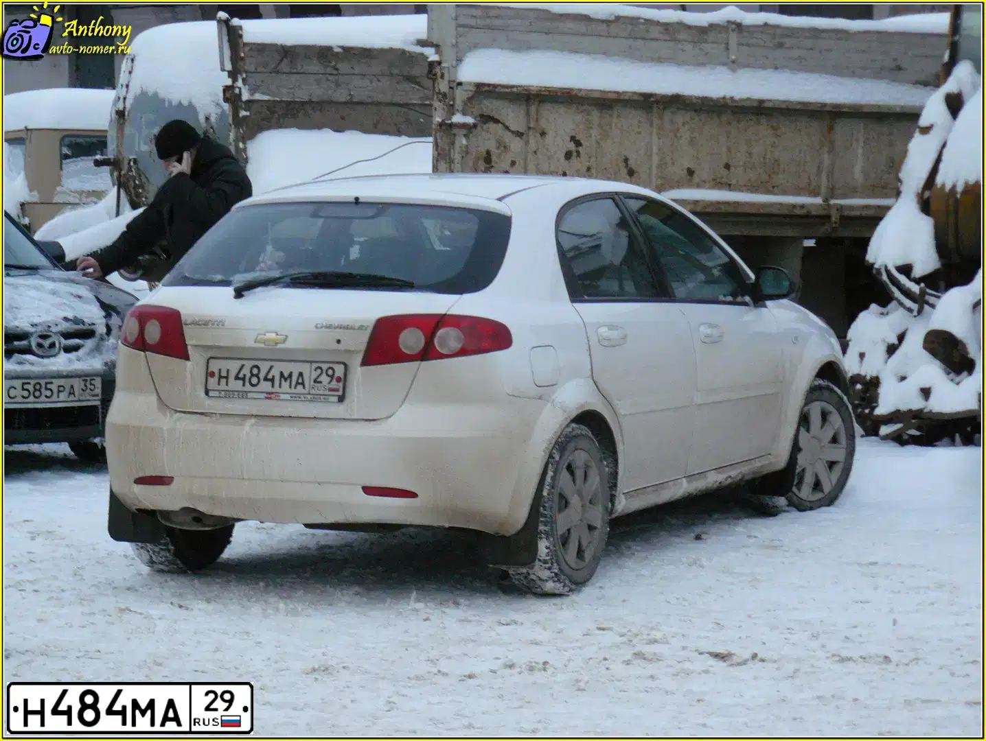 Фото автомобиля CHEVROLET LACETTI, 2009 — госномер К261КР29. Цвет: БЕЛЫЙ