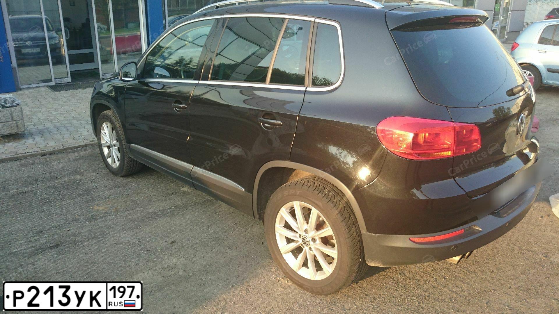 Фото автомобиля VOLKSWAGEN TIGUAN, 2012 — госномер Е146ВС799. Цвет: ЧЕРНЫЙ