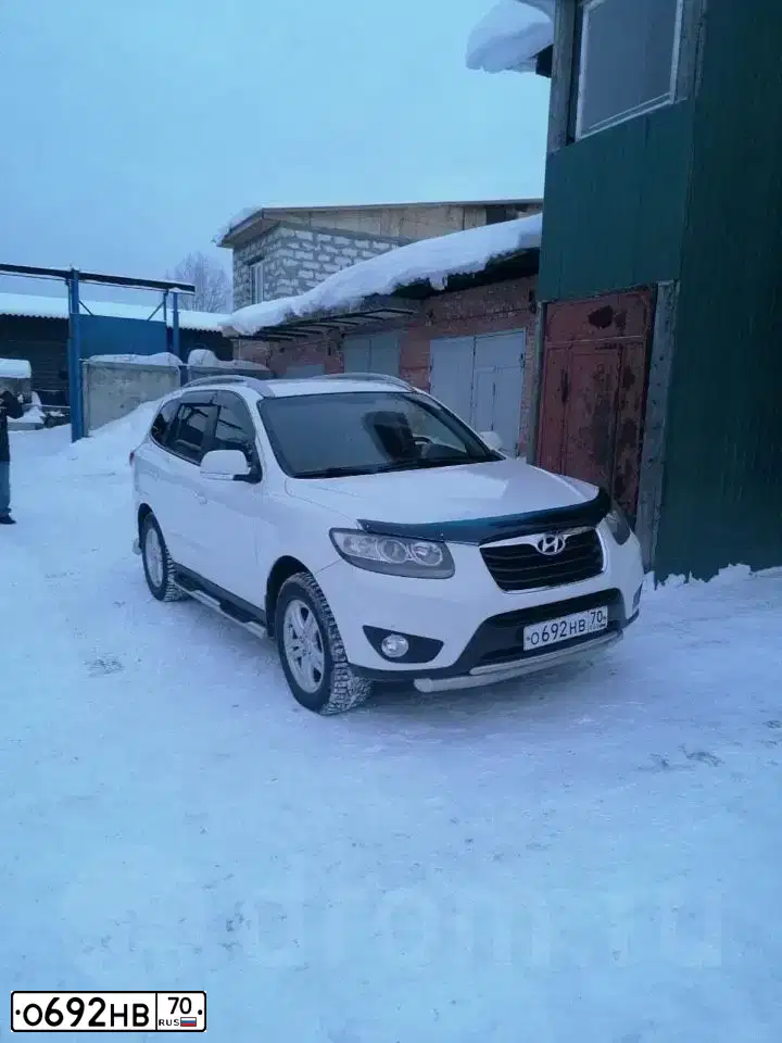 Фото автомобиля HYUNDAI SANTA FE, 2010 — госномер Н035НР142. Цвет: Белый