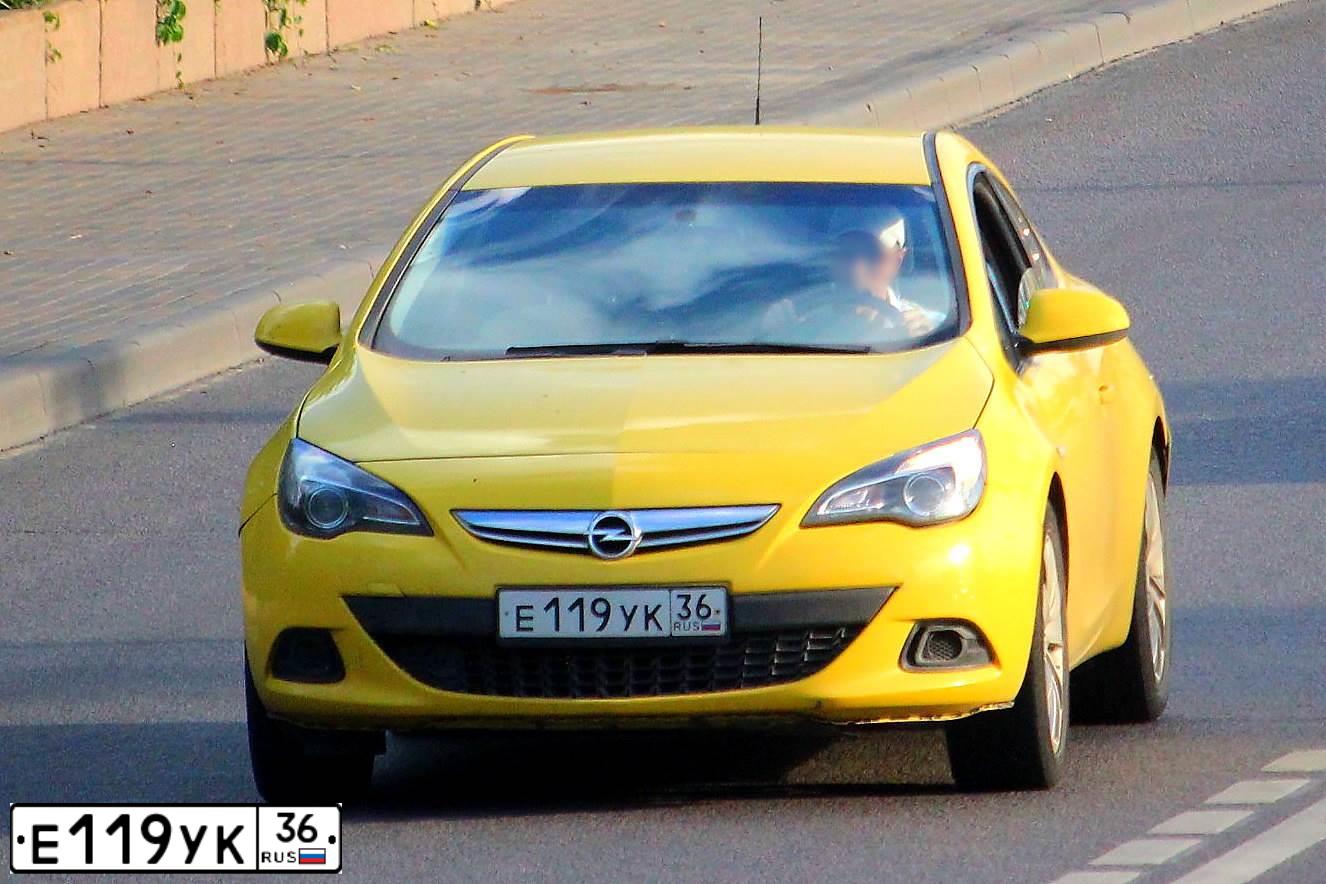 Фото автомобиля OPEL ASTRA, 2012 — госномер Е119УК36. Цвет: ЖЁЛТЫЙ