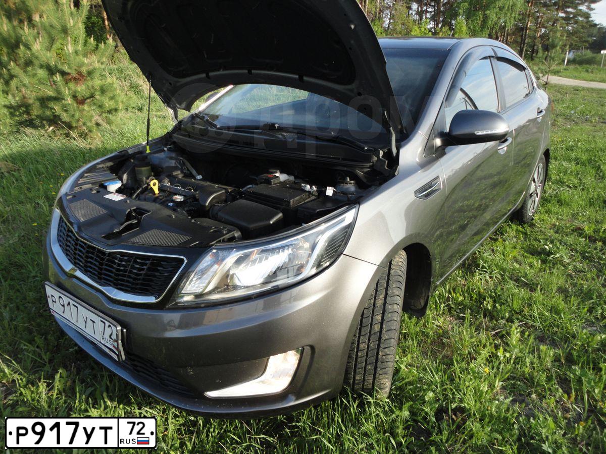 Фото автомобиля KIA RIO, 2015 — госномер Х273РУ72. Цвет: ТЕМНО-СЕРЫЙ