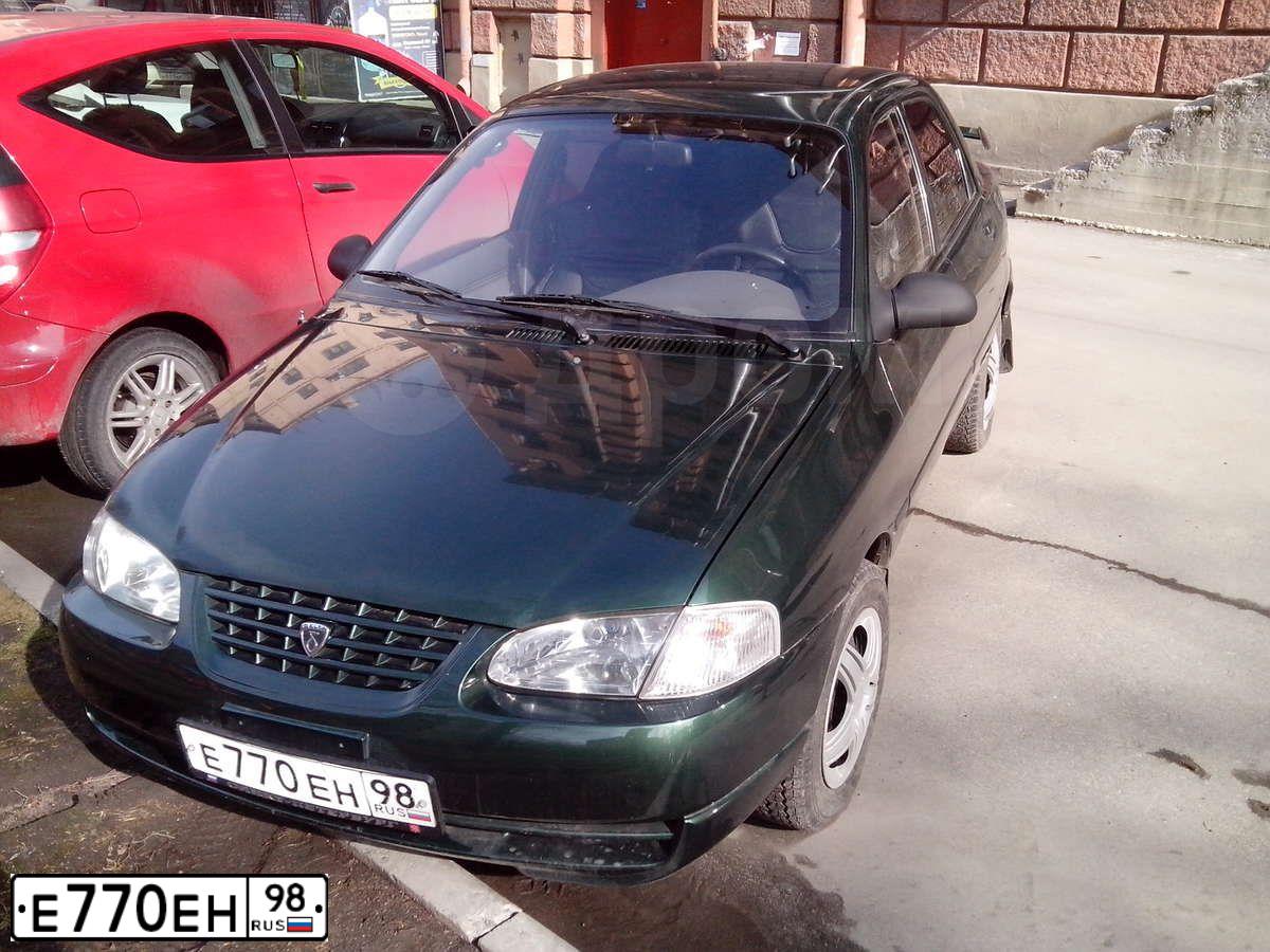 Фото автомобиля KIA AVELLA, 1999 — госномер А848ЕО147. Цвет: Темно-зеленый