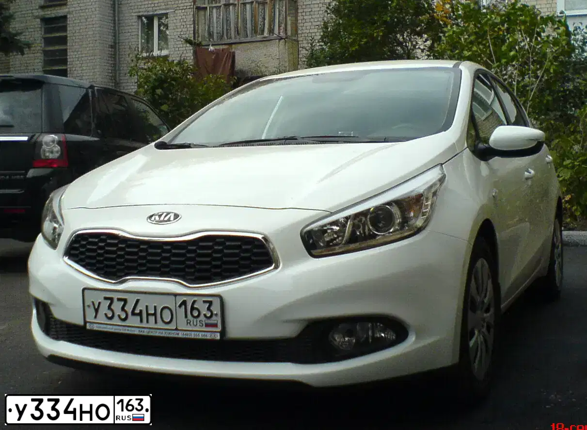 Фото автомобиля KIA CEE'D, 2015 — госномер У334НО163. Цвет: Белый
