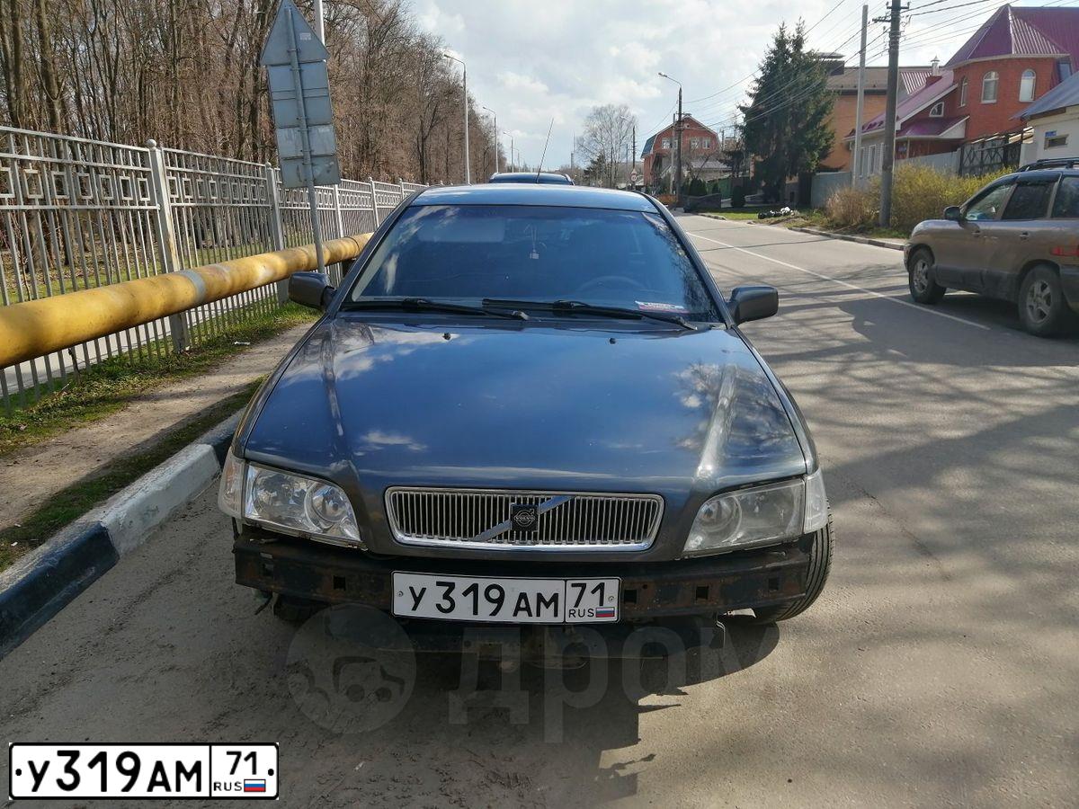 Фото автомобиля VOLVO V40, 2004 — госномер М328СЕ190. Цвет: СЕРЫЙ ТЕМНЫЙ